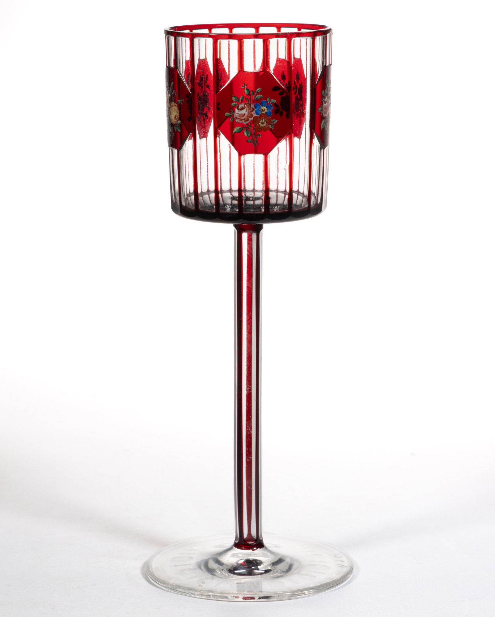BOHEMIAN / CZECH ART DECO CUT-OVERLAY GLASS WINE / GOBLET: BOHEMIAN / CZECH ART DECO CUT-OVERLAY GLASS WINE / GOBLET, ruby red to colorless, deep bucket bowl raised on a tall five-sided cut-paneled stem and round foot, cut decoration featuring vertical paneli