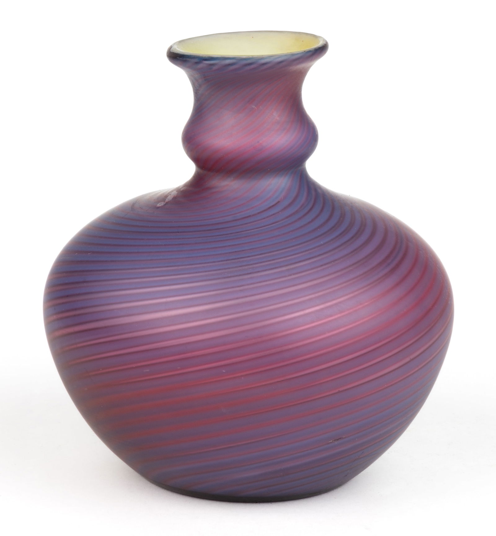 STEVENS AND WILLIAMS POMPEIAN SWIRL / VERRE DE SOIE VASE: STEVENS AND WILLIAMS POMPEIAN SWIRL / VERRE DE SOIE VASE, shaded amethyst and cranberry, compressed urn form, polished pontil mark. Circa 1886. 5 1/2" H. Literature: Parallels Hajdamach - En