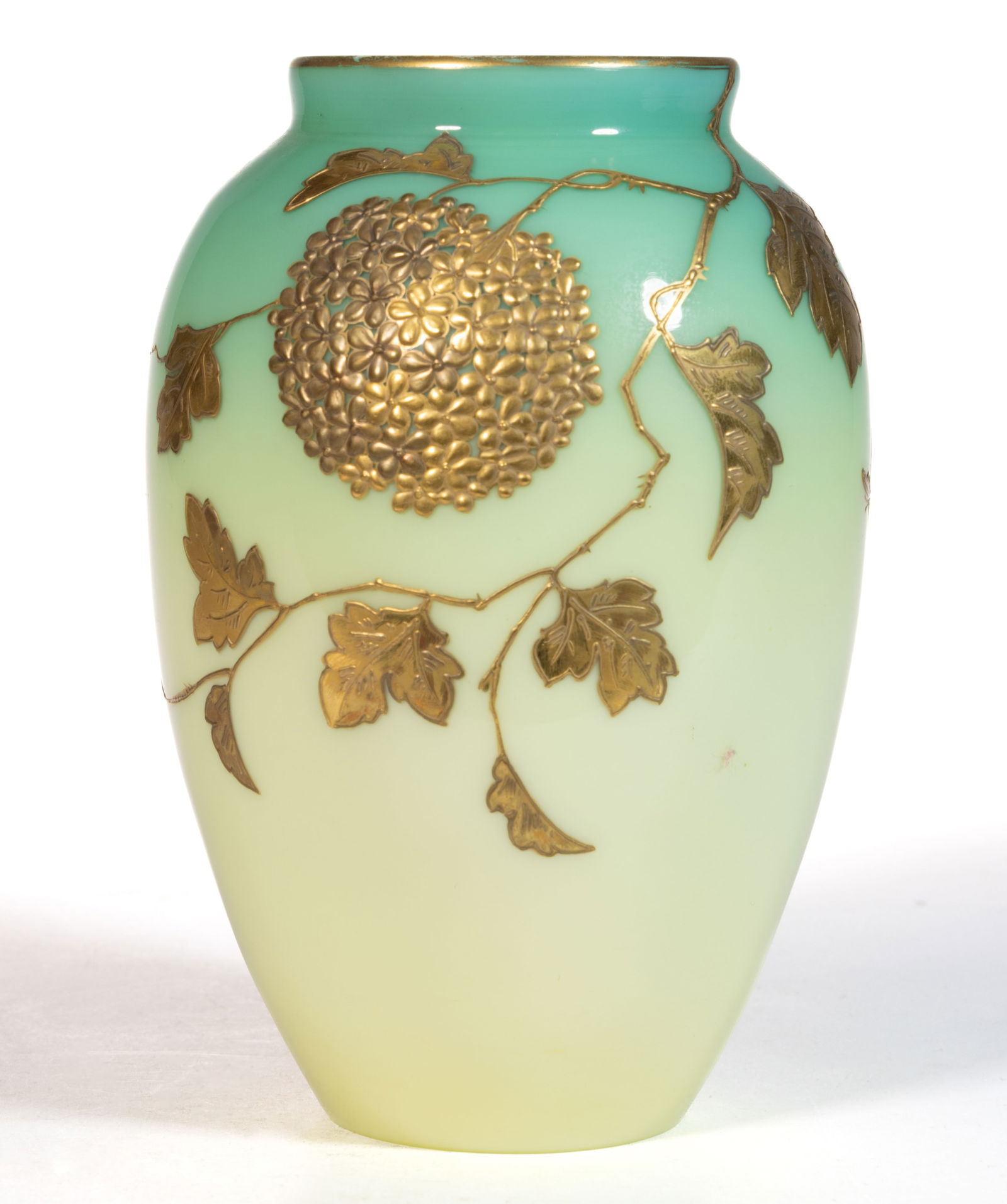 SIGNED THOMAS WEBB & SONS CASED AND GILT-DECORATED ART GLASS VASE: SIGNED THOMAS WEBB & SONS CASED AND GILT-DECORATED ART GLASS VASE, opaque yellowish-white/custard interior (reacts under black light) cased in a true heat-sensitive layer of glass shaded from pale