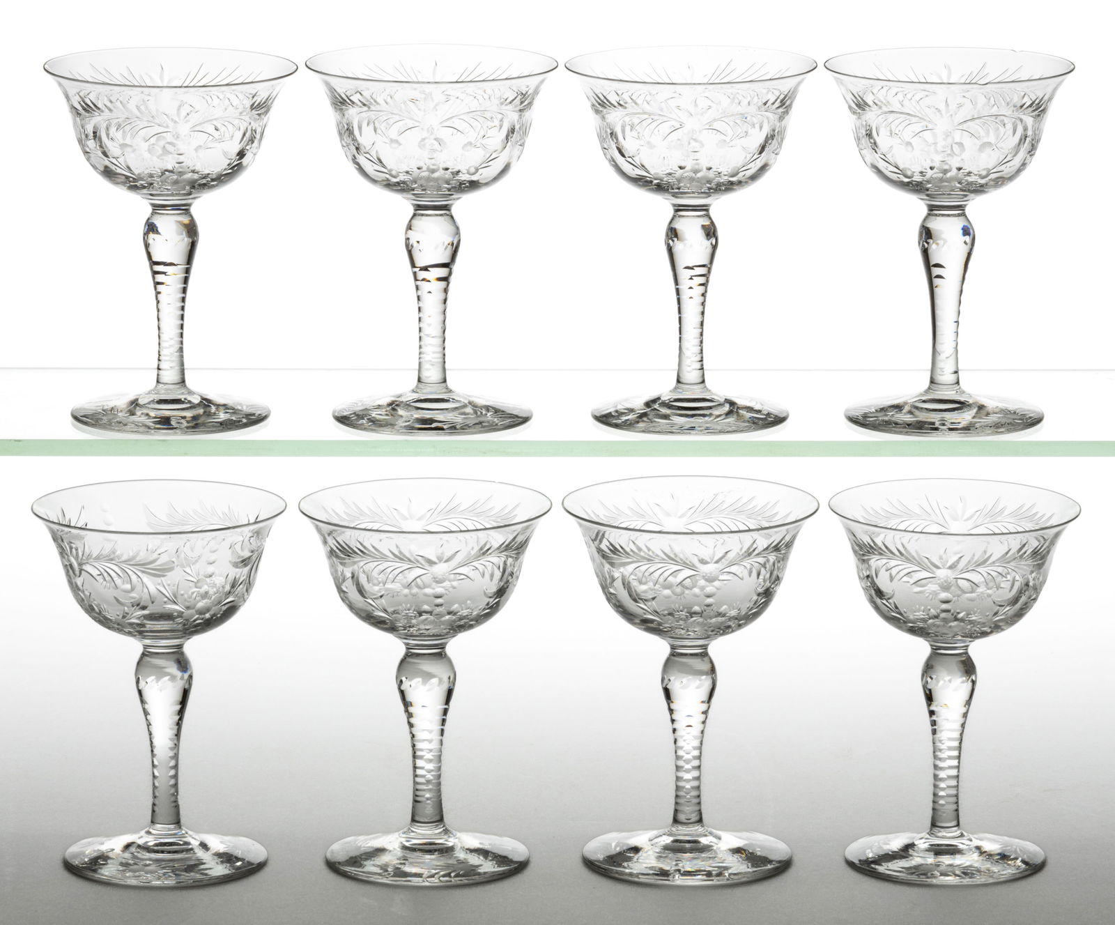 HAWKES FERN AND FRUITS CUT GLASS SHERBETS, LOT OF EIGHT: HAWKES FERN AND FRUITS CUT GLASS SHERBETS, LOT OF EIGHT, colorless, each having reserves of fern cuts leading to a lower fruit bouquet, matching engraving to the underside of the foot, some signed to