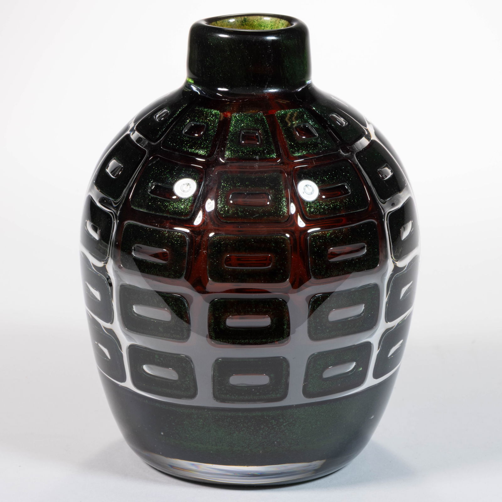 EDVIN OHRSTROM (SWEDISH, 1906-1994) ARIEL VARIANT GRAAL STUDIO ART GLASS VASE: EDVIN OHRSTROM (SWEDISH, 1906-1994) ARIEL VARIANT GRAAL STUDIO ART GLASS VASE, orange cased colorless with aventurine green decoration, ovoid form with ten vertical columns of stacked rectangles