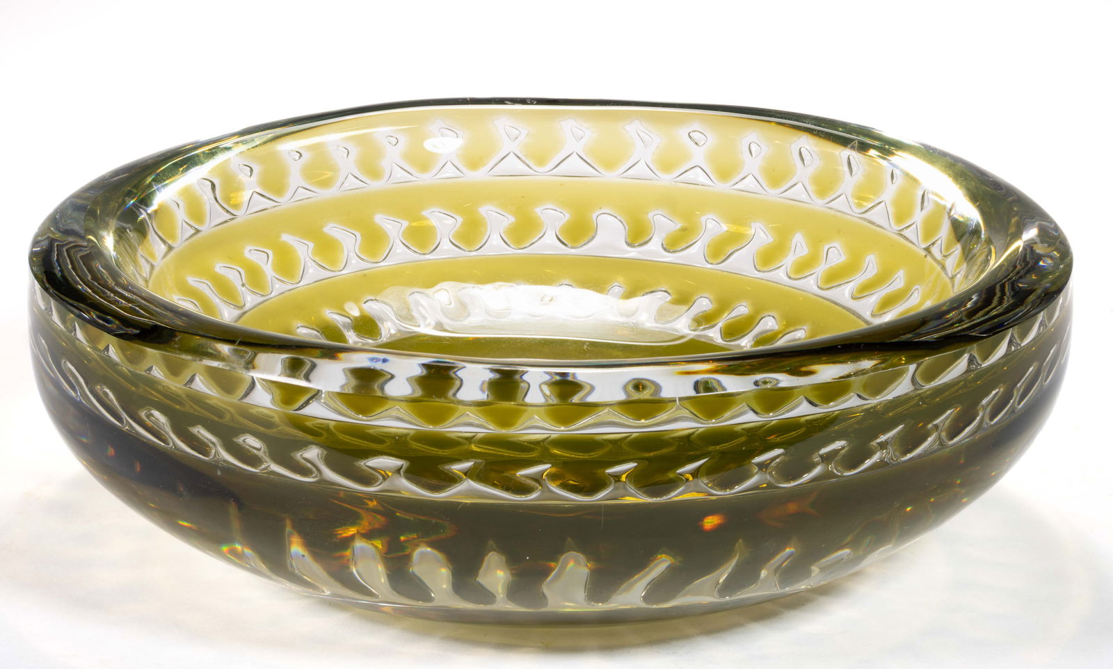 EDVIN OHRSTROM (SWEDISH, 1906-1994) CONCENTRIC RINGS ARIEL STUDIO ART GLASS BOWL: EDVIN OHRSTROM (SWEDISH, 1906-1994) CONCENTRIC RINGS ARIEL STUDIO ART GLASS BOWL, green cased colorless, three concentric air-trap rings, signed to the underside, "ORREFORS/Ariel 371-E3/Edvin Ohr