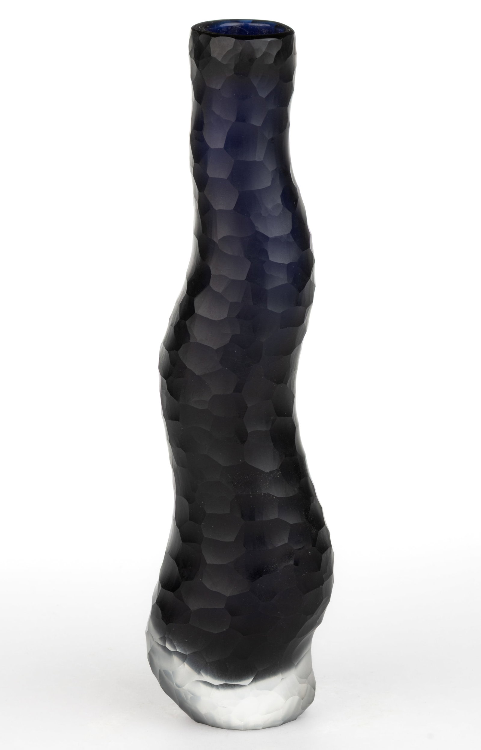 FINNISH / MURANO BATUTTO CUT AND CASED STUDIO ART GLASS BRANCH VASE: FINNISH / MURANO BATUTTO CUT AND CASED STUDIO ART GLASS BRANCH VASE, near black without light but in light a deep cobalt blue cased colorless, curving vine form with Batutto cutting overall, polished 