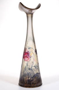 ERWIN EISCH (GERMANY, 1927-2022) DRAGONFLIES AND FLOWERS ENAMEL DECORATED ART GLASS VASE: ERWIN EISCH (GERMANY, 1927-2022) DRAGONFLIES AND FLOWERS ENAMEL DECORATED ART GLASS VASE, tapered form with a fan mouth, colorless iridescent with fine polychrome-enamel decoration of various flowers