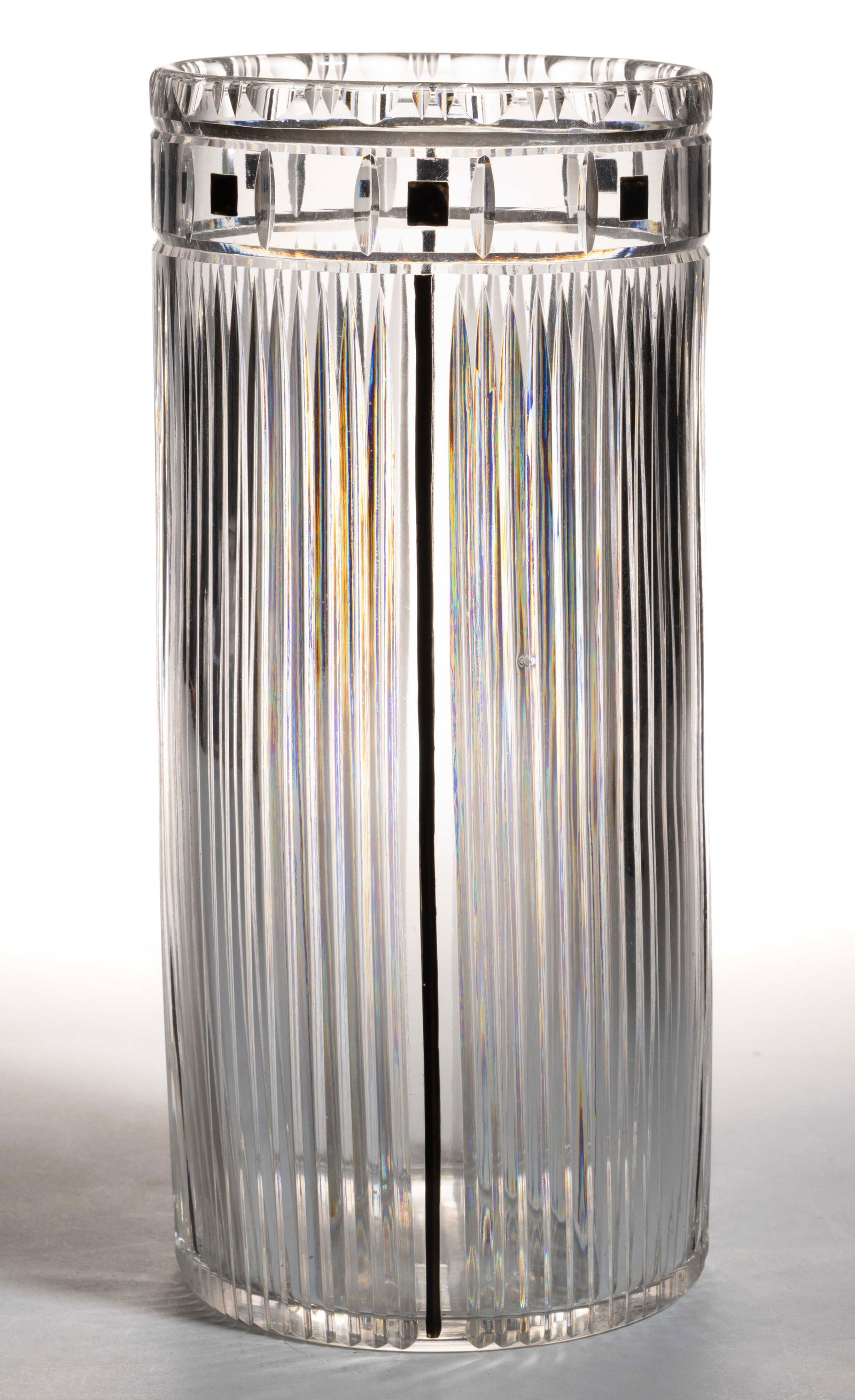 JOSEF HOFFMAN (AUSTRIAN, 1870-1956) BLOWN AND CUT ART GLASS CYLINDER VASE: JOSEF HOFFMAN (AUSTRIAN, 1870-1956) BLOWN AND CUT ART GLASS CYLINDER VASE, colorless with black enamel decoration, cylinder for with upper band of square cuts with elongated prism cuts running down th