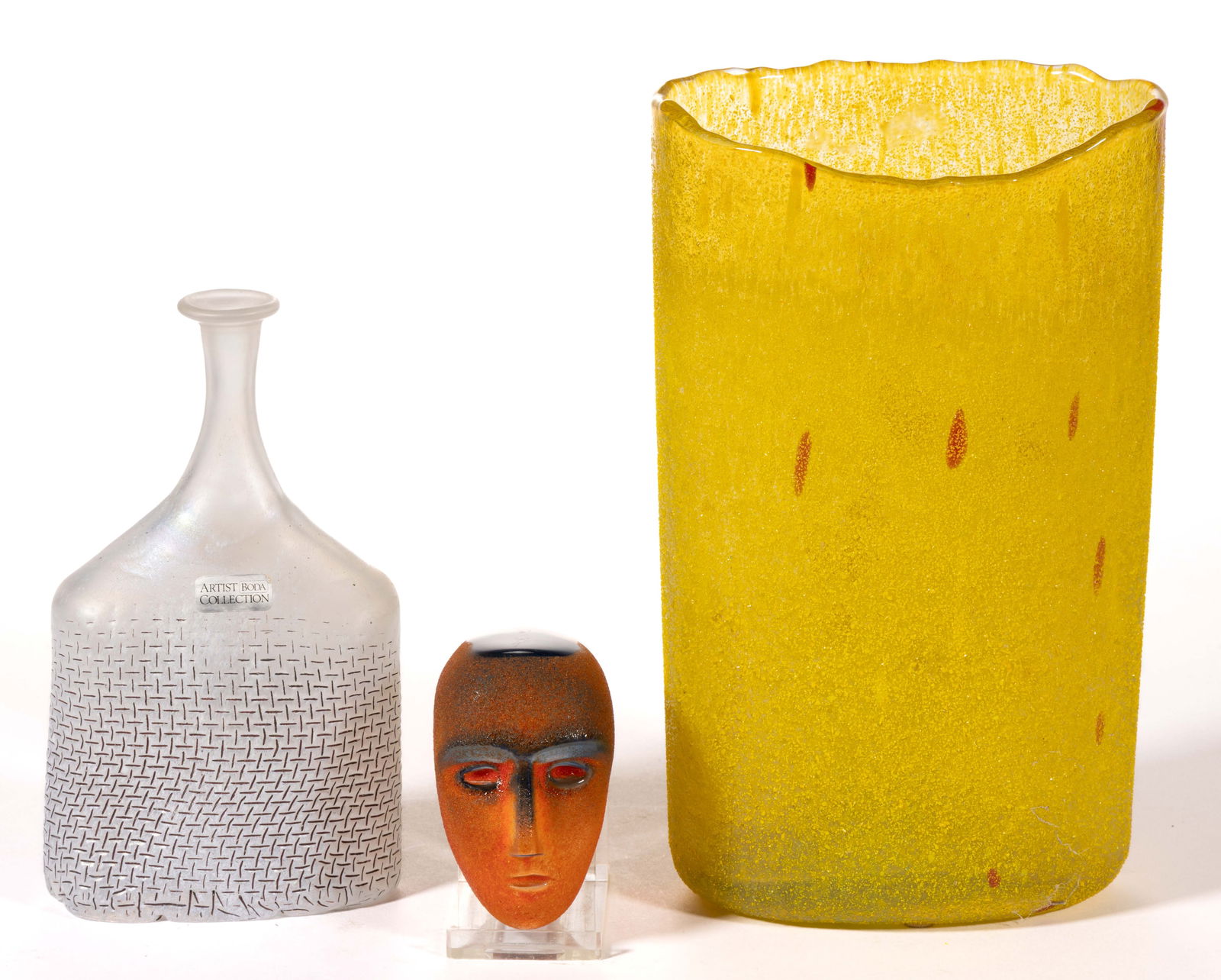 BERTIL VALLIEN (SWEDISH, B. 1938) STUDIO ART GLASS ARTICLES, LOT OF THREE: BERTIL VALLIEN (SWEDISH, B. 1938) STUDIO ART GLASS ARTICLES, LOT OF THREE, comprising a blue Brain sculpture with orange frit decoration to the exterior, a colorless/opal iridescent basketweave bottle
