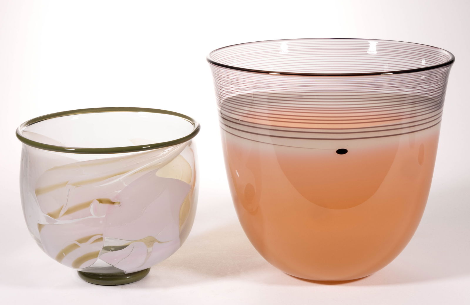 SWEDISH STUDIO ART GLASS VASES, LOT OF TWO: SWEDISH STUDIO ART GLASS VASES, LOT OF TWO, comprising an Anna Ehrner applied plaques example with white, brown and rose plaques, and a Wilke Adolfsson peach bowl form with upper amethyst threading, w