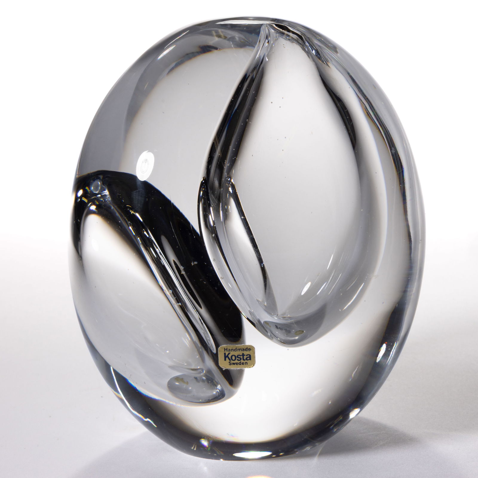 GORAN WARFF (SWEDISH, 1933-2002) CONTROLLED BUBBLE STUDIO ART GLASS SCULPTURE: GORAN WARFF (SWEDISH, 1933-2002) CONTROLLED BUBBLE STUDIO ART GLASS SCULPTURE, colorless, globular form with two large interior bubbles, signed to the underside, "KOSTA ROYAL ART SCULPTURE/GORAN