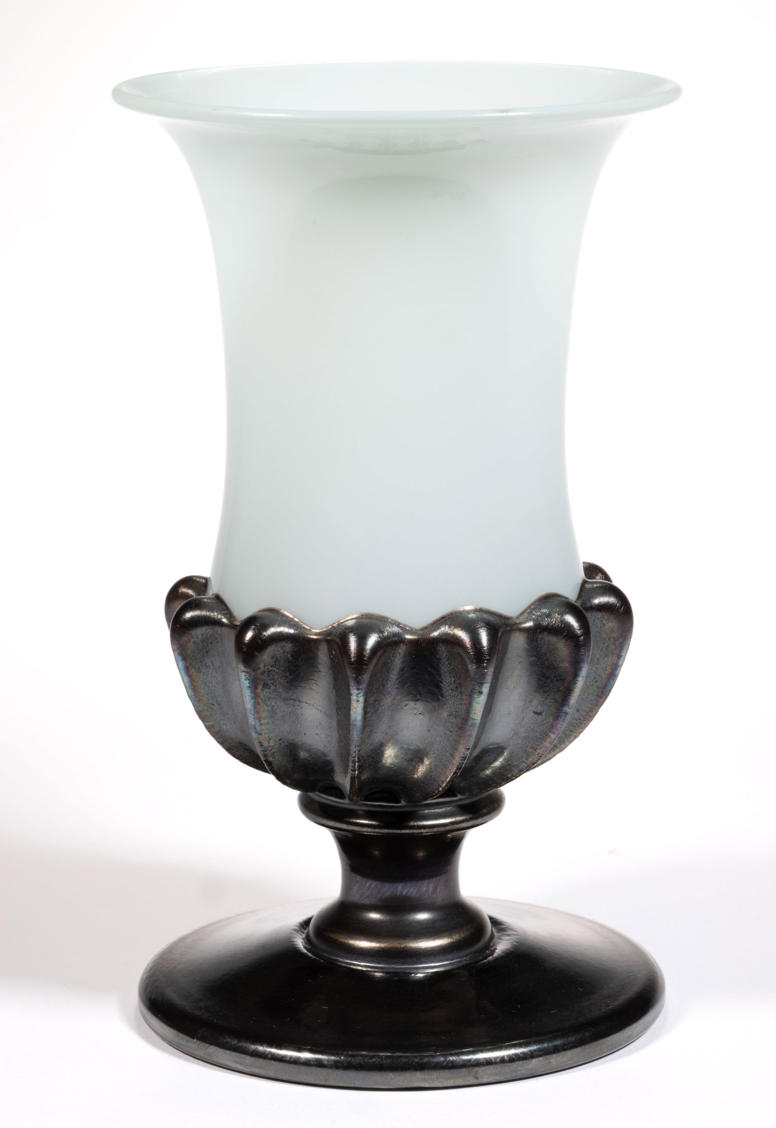 ART REED (AMERICAN, B. 1953) OPALINE AND IRIDESCENT GADROON STUDIO ART GLASS VASE: ART REED (AMERICAN, B. 1953) OPALINE AND IRIDESCENT GADROON STUDIO ART GLASS VASE, opal cylindrical body with a flaring rim, platinum iridescent gadroon decoration which also comprises the stem and fo