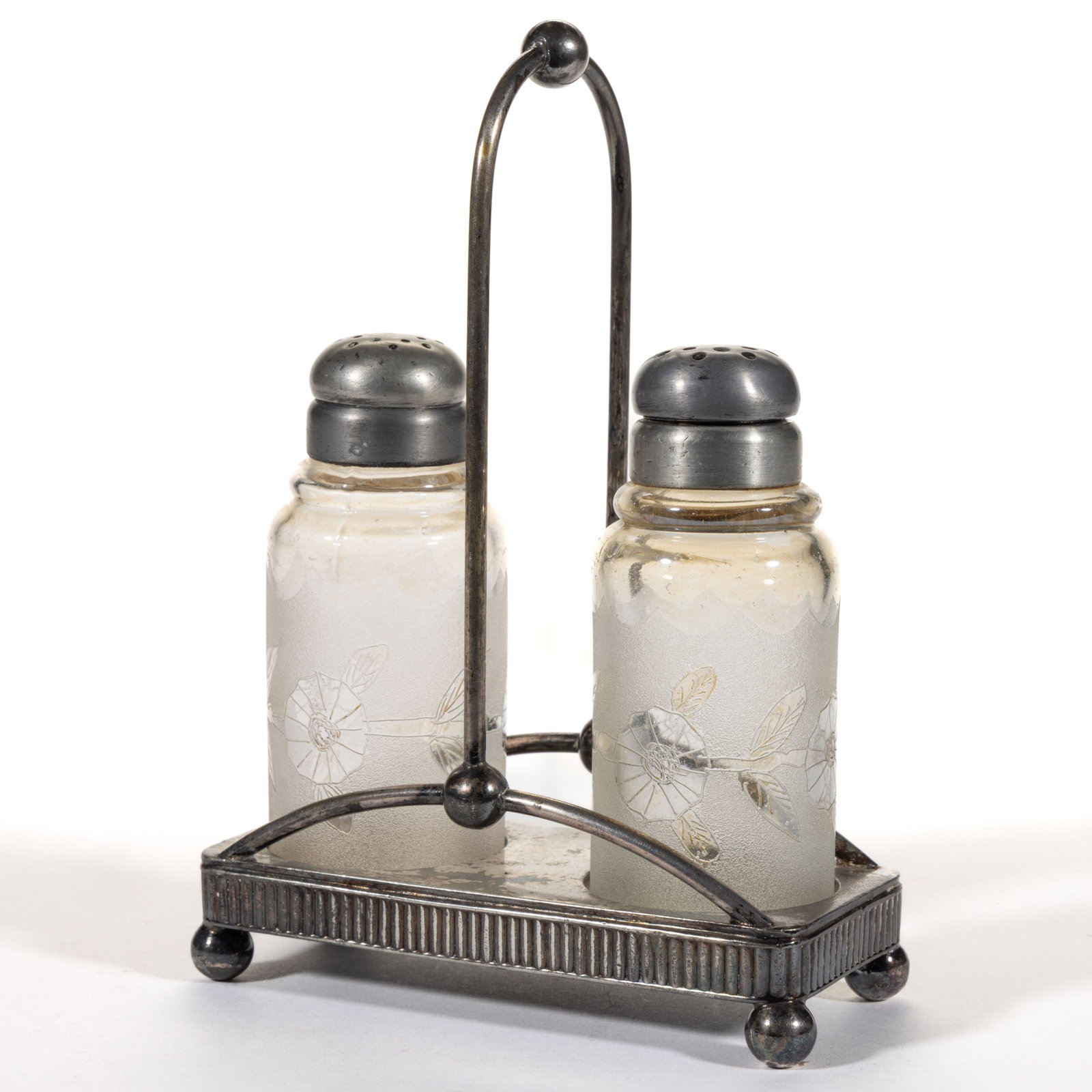 POMONA CORNFLOWER - SECOND PATENT ETCHED ART GLASS SALT AND PEPPER SHAKER IN STAND: POMONA CORNFLOWER - SECOND PATENT ETCHED ART GLASS SALT AND PEPPER SHAKER IN STAND, colorless with light amber iridescence, each cylindrical form with etched Cornflower decoration, each havi