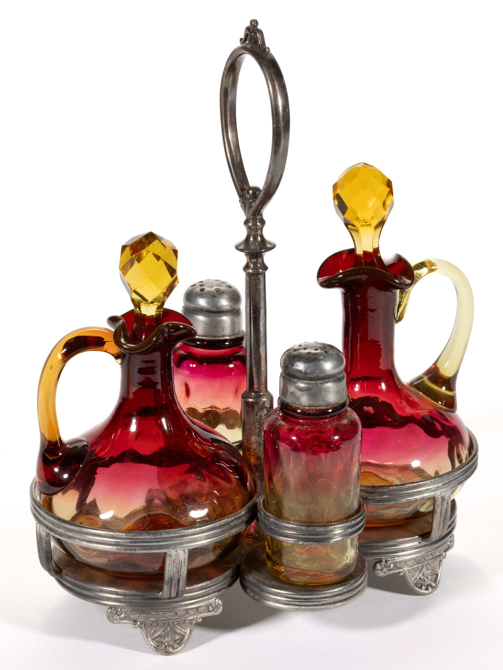 VICTORIAN AMBERINA SPOT-OPTIC GLASS FOUR-BOTTLE CONDIMENT SET: VICTORIAN AMBERINA SPOT-OPTIC GLASS FOUR-BOTTLE CONDIMENT SET, comprising two cruets with a period amber cut-faceted stopper, and a cylindrical salt and pepper shaker with a period two-part lid; fitte