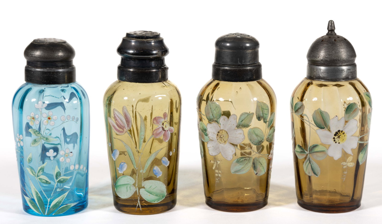 NEW ENGLAND TALL OPTIC RIB ENAMEL DECORATED GLASS SALT AND PEPPER SHAKERS, LOT OF FOUR: NEW ENGLAND TALL OPTIC RIB ENAMEL DECORATED GLASS SALT AND PEPPER SHAKERS, LOT OF FOUR, comprising three amber with two having matching decoration and the other having pink flowers, and a blue example