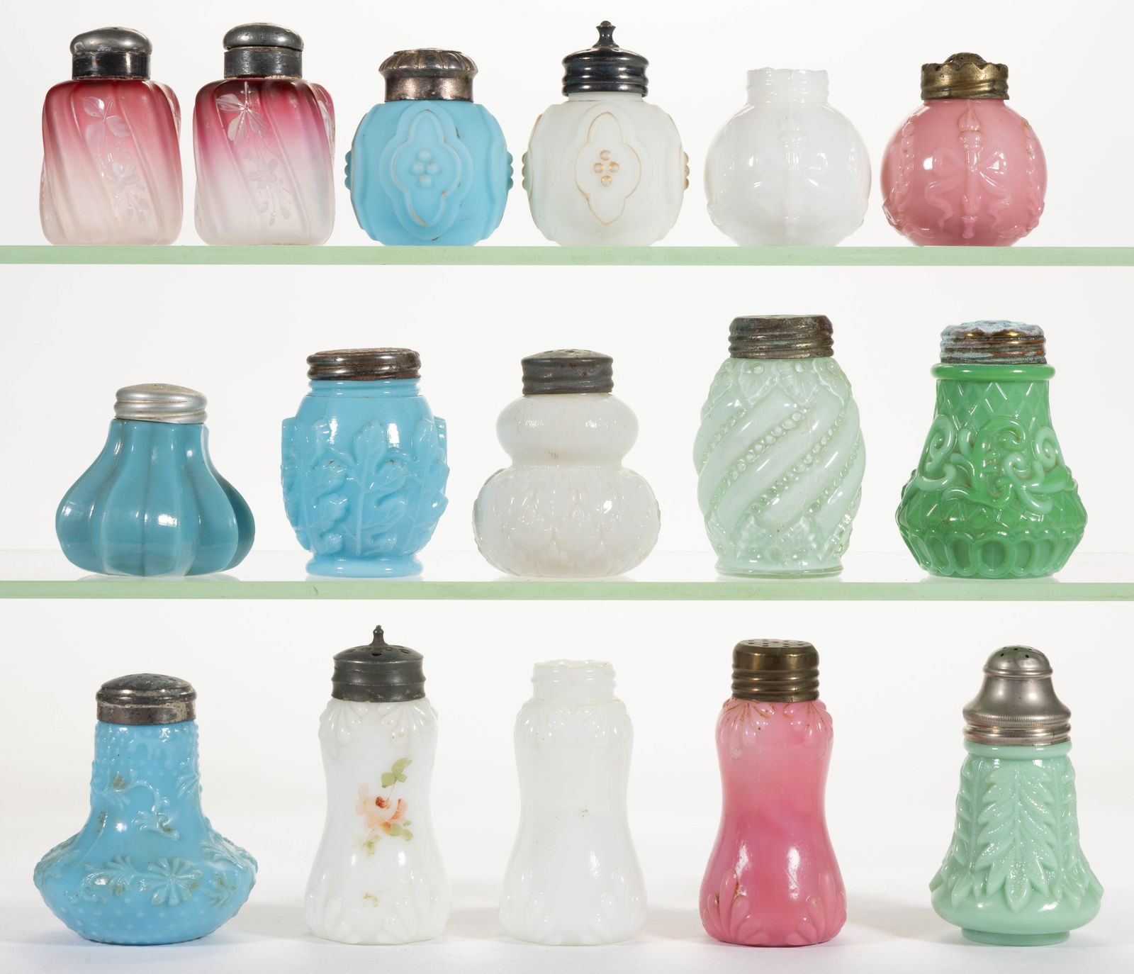 ASSORTED DITHRIDGE SALT AND PEPPER SHAKERS, LOT OF 16: ASSORTED DITHRIDGE SALT AND PEPPER SHAKERS, LOT OF 16, frosted rubina, green cased, the remainder opaque blue, green, pink, and white/milk glass, including Beaded Bottom, Paneled Four Dot, Double Fan