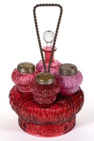 FIGURAL CROWN GLASS FOUR-BOTTLE CONDIMENT SET