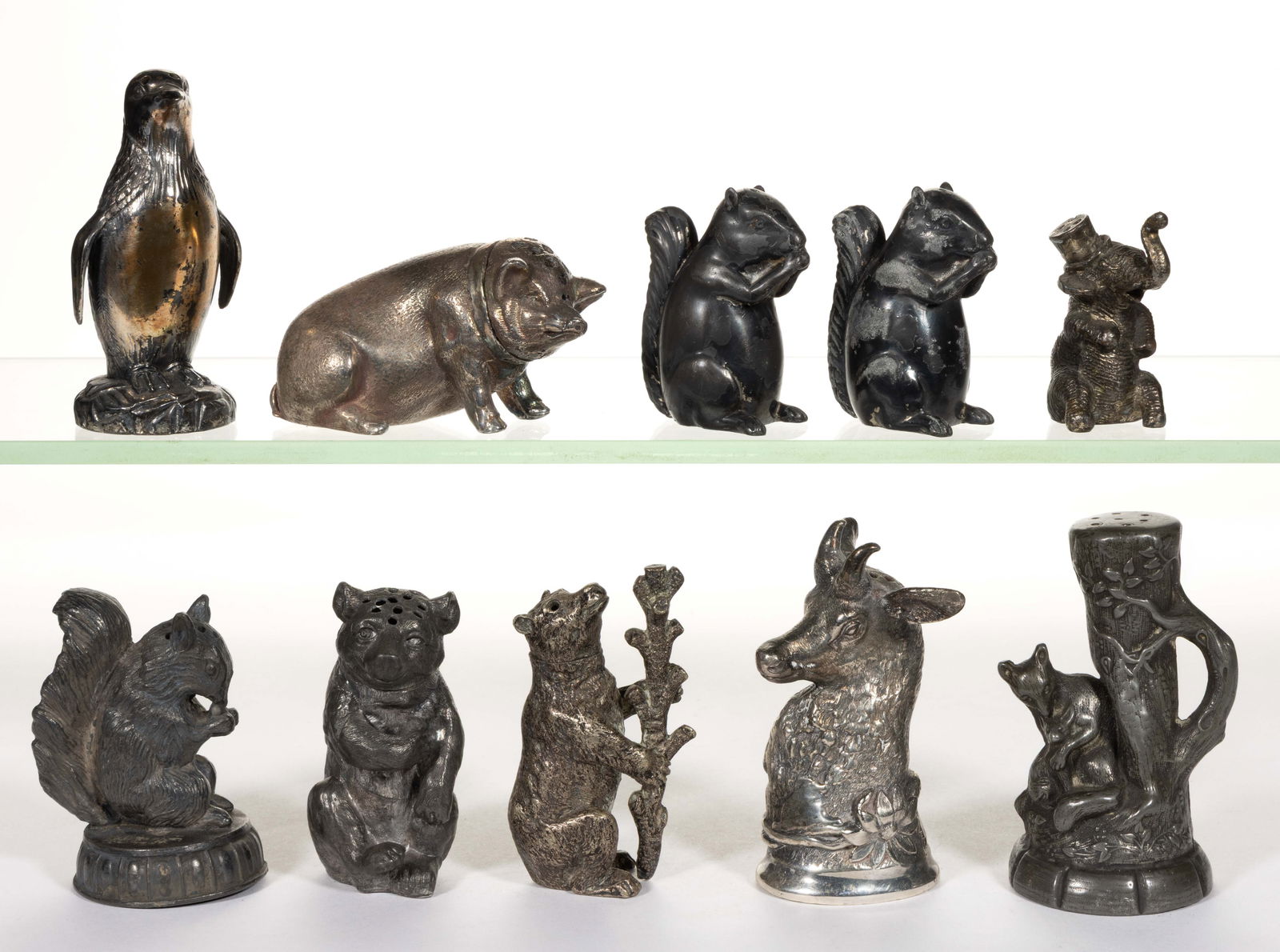 ASSORTED SILVER-PLATED / OTHER METAL FIGURAL ANIMAL SALT / PEPPER SHAKERS, LOT OF TEN: ASSORTED SILVER-PLATED / OTHER METAL FIGURAL ANIMAL SALT / PEPPER SHAKERS, LOT OF TEN, comprising two pieces by Pairpoint Mfg. Co./Corp. of New Bedford, MA (active 1880-1958) of a pig and a deer-like