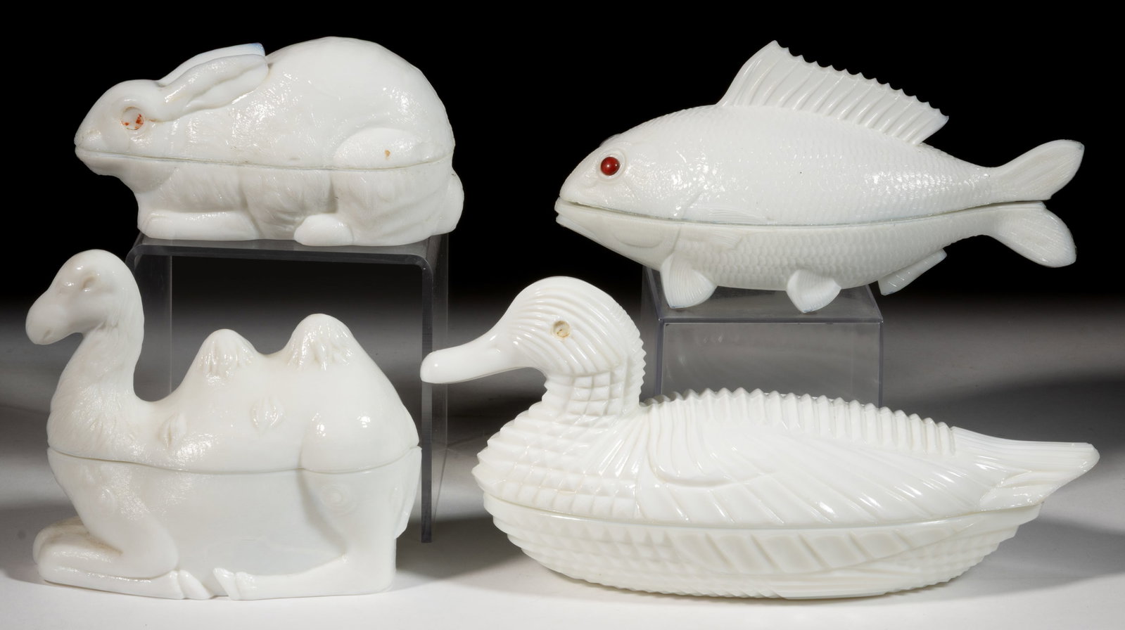 ASSORTED PRESSED GLASS NOVELTY FIGURAL ANIMAL COVERED DISHES, LOT OF FOUR: ASSORTED PRESSED GLASS NOVELTY FIGURAL ANIMAL COVERED DISHES, LOT OF FOUR, opaque white/milk glass, comprising an Atterbury Duck and a small Rabbit (each embossed with patent dates to undersides), a C
