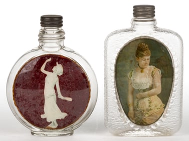 LABEL UNDER GLASS FEMALE PORTRAIT WHISKEY FLASKS / BOTTLES, LOT OF TWO