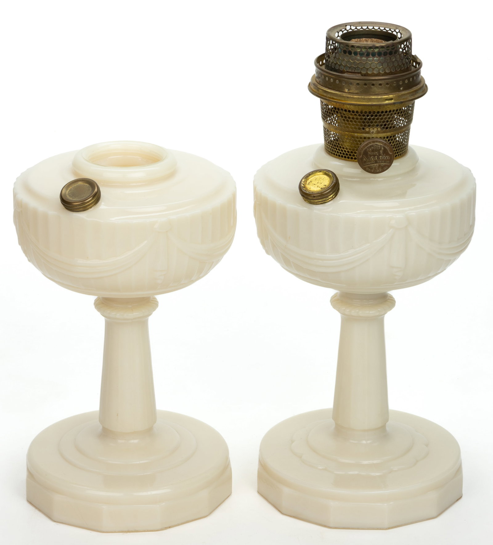ALADDIN MODEL NO. B-75 / TALL LINCOLN DRAPE KEROSENE STAND LAMPS, LOT OF TWO: ALADDIN MODEL NO. B-75 / TALL LINCOLN DRAPE KEROSENE STAND LAMPS, LOT OF TWO, Ivory Alacite (reacts under black light), each with a lightly ribbed plain stem and a 12-sided foot, underside of foo