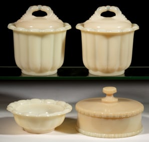 ALADDIN AND MCKEE ALACITE ASSORTED COVERED DRESSER JARS, LOT OF FOUR