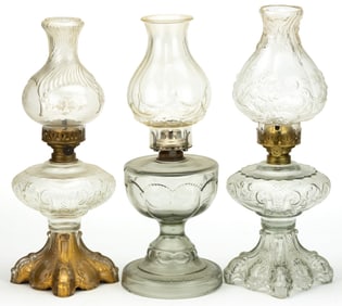 ASSORTED PATTERNED MASSIVE / SEWING KEROSENE STAND LAMPS, LOT OF THREE