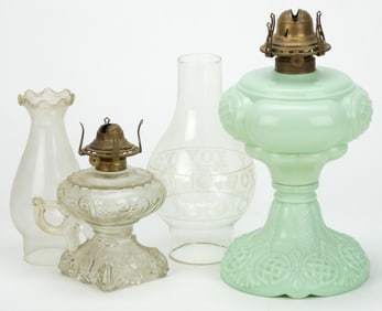 ASSORTED PATTERNED KEROSENE LAMPS, LOT OF TWO