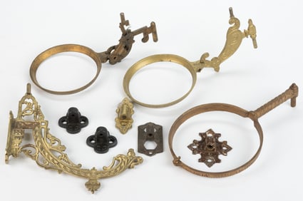 ASSORTED MANUFACTURERS CAST-IRON LAMP WALL MOUNT BRACKET FRAMES AND WALL PLATES, LOT OF NINE