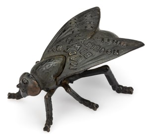 CAST-IRON SIGNED BROADWAY NOVELTY ADVERTISING CO. FIGURAL FLY MATCH HOLDER
