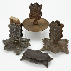 ASSORTED CAST-IRON AND CAST-BRASS TABLE-TOP MATCH HOLDERS, LOT OF FOUR