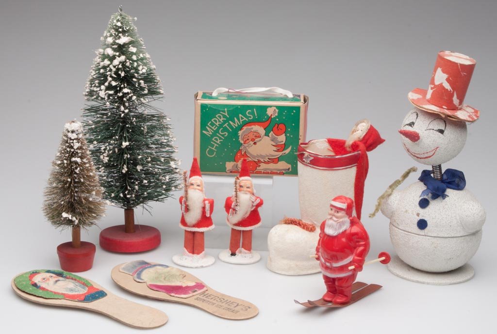 ASSORTED CHRISTMAS DECORATIONS, LOT OF TEN: ASSORTED CHRISTMAS DECORATIONS, LOT OF TEN, including a German snowman nodder candy container. 20th century. Nodder 8 1/2" H. Provenance: From the collection of the late Betty Jane Renn, Sunbury, PA.