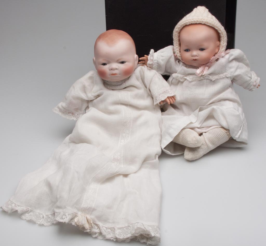 GERMAN BISQUE-HEAD INFANT DOLLS, LOT OF TWO: GERMAN BISQUE-HEAD INFANT DOLLS, LOT OF TWO, comprising a Grace S. Putnam Bye-Lo and an Armand Marseille #341, each with sleeping eyes closed mouth, cloth body and celluloid hands. Vintage clothing. C