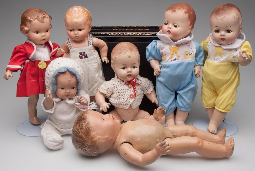 ASSORTED COMPOSITION DOLLS, LOT OF SEVEN: ASSORTED COMPOSITION DOLLS, LOT OF SEVEN, including a marked Effanbee grumpy baby. First half 20th century. 10" to 13" H. Provenance: Collection of the late Veronica "Ronnie" Riefler Strathmann, Pitts