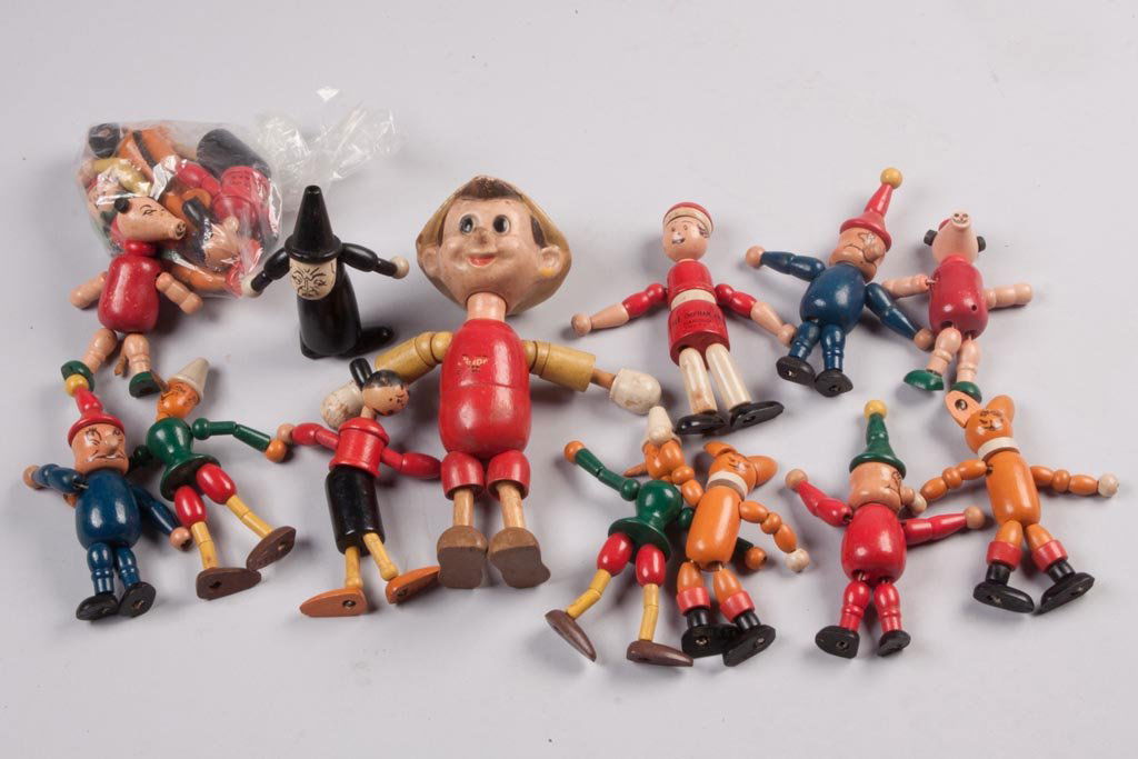 COMIC CHARACTER AND OTHER WOODEN FLEX FIGURES, LOT OF 1: COMIC CHARACTER AND OTHER WOODEN FLEX FIGURES, LOT OF 16, including Pinocchio, Little Orphan Annie and Sandy, Olive Oyl, etc. Makers include Ideal and Jaymar. First half 20th century. Pinocchio 8" H.