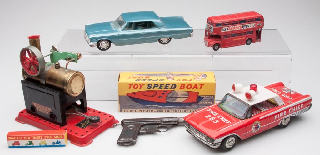 ASSORTED METAL AND PLASTIC TOYS, LOT OF SEVEN: ASSORTED METAL AND PLASTIC TOYS, LOT OF SEVEN, including a 1963 Ford Galaxie promotional auto, a Mamod steam engine, and a Dinky Routemaster Bus. 20th century. 4" to 9" L. Provenance: From a Connectic