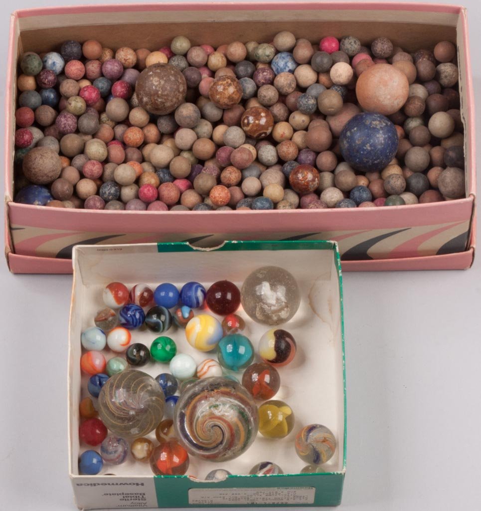 ASSORTED HAND-MADE AND MACHINE MARBLES: ASSORTED HAND-MADE AND MACHINE MARBLES, uncounted lot, including swirls, clays, etc. Late 19th to mid 20th century. 1/2" to 2" D. Provenance: From the collection of the late Betty Jane Renn, Sunbury, 