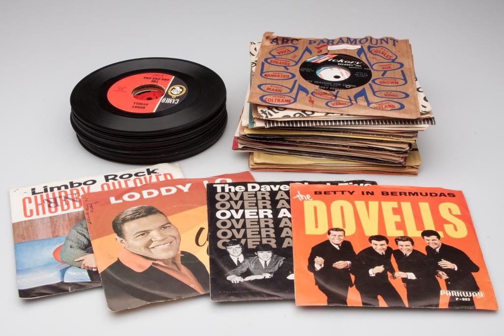 ROCK AND POP 45-RPM RECORDS: ROCK AND POP 45-RPM RECORDS, approximately 60, including Chubby Checker, Dave Clark Five and the Dovells picture sleeves. Late 1950s - 1960s. Provenance: Property of a Page Co., VA lady.