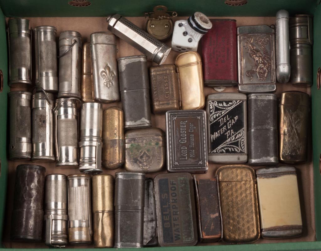 ASSORTED METAL MATCH SAFE AND RELATED ARTICLES, LOT OF : ASSORTED METAL MATCH SAFE AND RELATED ARTICLES, LOT OF 35, some with advertising. 19th and 20th century. 2" to 2 3/4" L. Provenance: From the collection of the late Betty Jane Renn, Sunbury, PA.