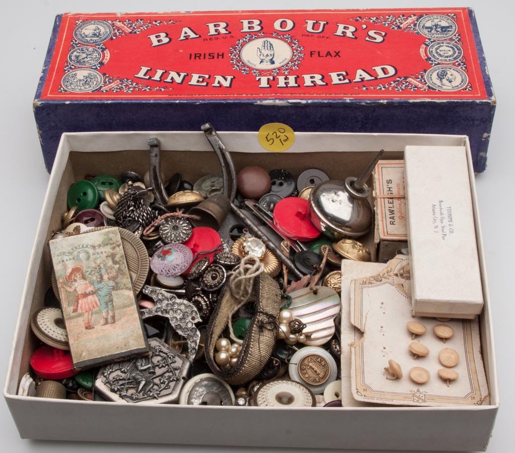 ASSORTED BUTTONS AND OTHER SEWING ARTICLES: ASSORTED BUTTONS AND OTHER SEWING ARTICLES, including a glass paperweight button with eagle. Late 19th/mid 20th century. Various sizes. Provenance: From the collection of the late Betty Jane Renn, Sun