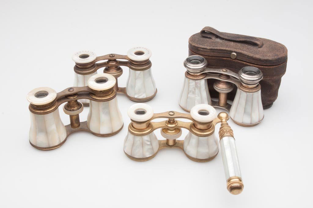 FRENCH MOTHER-OF-PEARL OPERA GLASSES, LOT OF FOUR: FRENCH MOTHER-OF-PEARL OPERA GLASSES, LOT OF FOUR, including one pair with side handle, one pair with case. Late 19th/early 20th century. 4" W. Provenance: From the collection of the late Betty Jane R