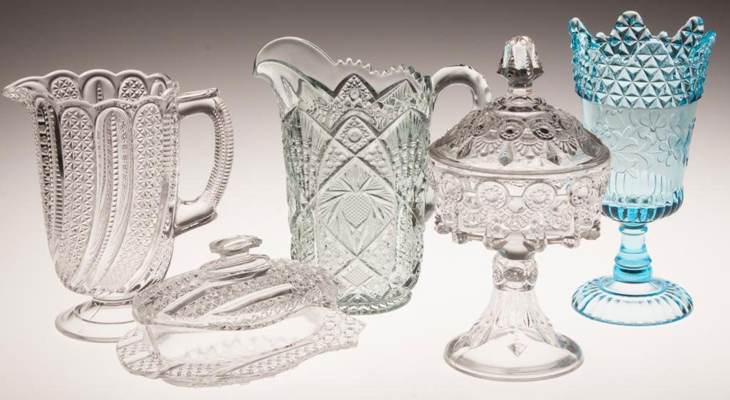 ASSORTED EAPG TABLE ARTICLES, LOT OF FIVE: ASSORTED EAPG TABLE ARTICLES, LOT OF FIVE, colorless and blue, including a Banner covered butter dish, a Feather milk pitcher, a Wildflower celery vase and an Alabama covered jelly compote. Fourth qua