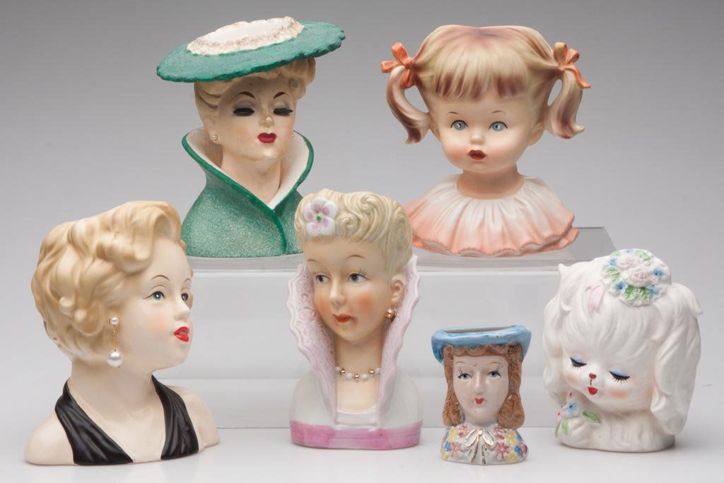 CERAMIC FIGURAL HEAD VASES, LOT OF SIX: CERAMIC FIGURAL HEAD VASES, LOT OF SIX, including a Marilyn Monroe reissue and a dog marked for Napco. Japan. 20th century. 3" to 6" H. Provenance: Property of a Page Co., VA lady.