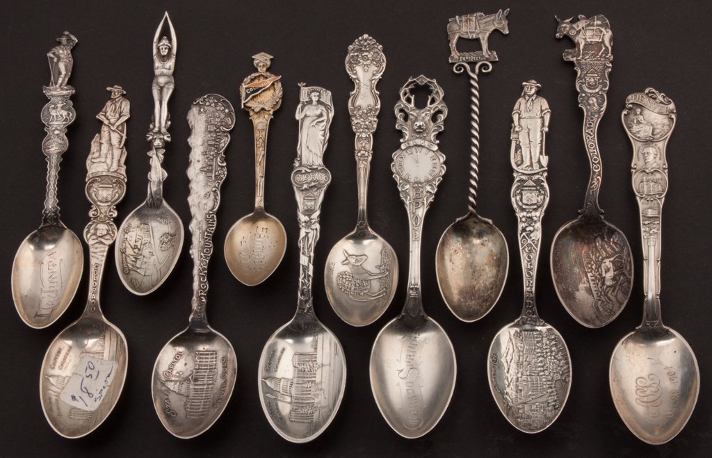 AMERICAN STERLING SILVER COLORADO THEME SOUVENIR SPOONS: AMERICAN STERLING SILVER COLORADO THEME SOUVENIR SPOONS, LOT OF 12, most full-figure handle including bathing beauty, miners, etc. Weight: 8.53 ozt. Late 19th/early 20th century. 4 1/4" to 6" L. Prove