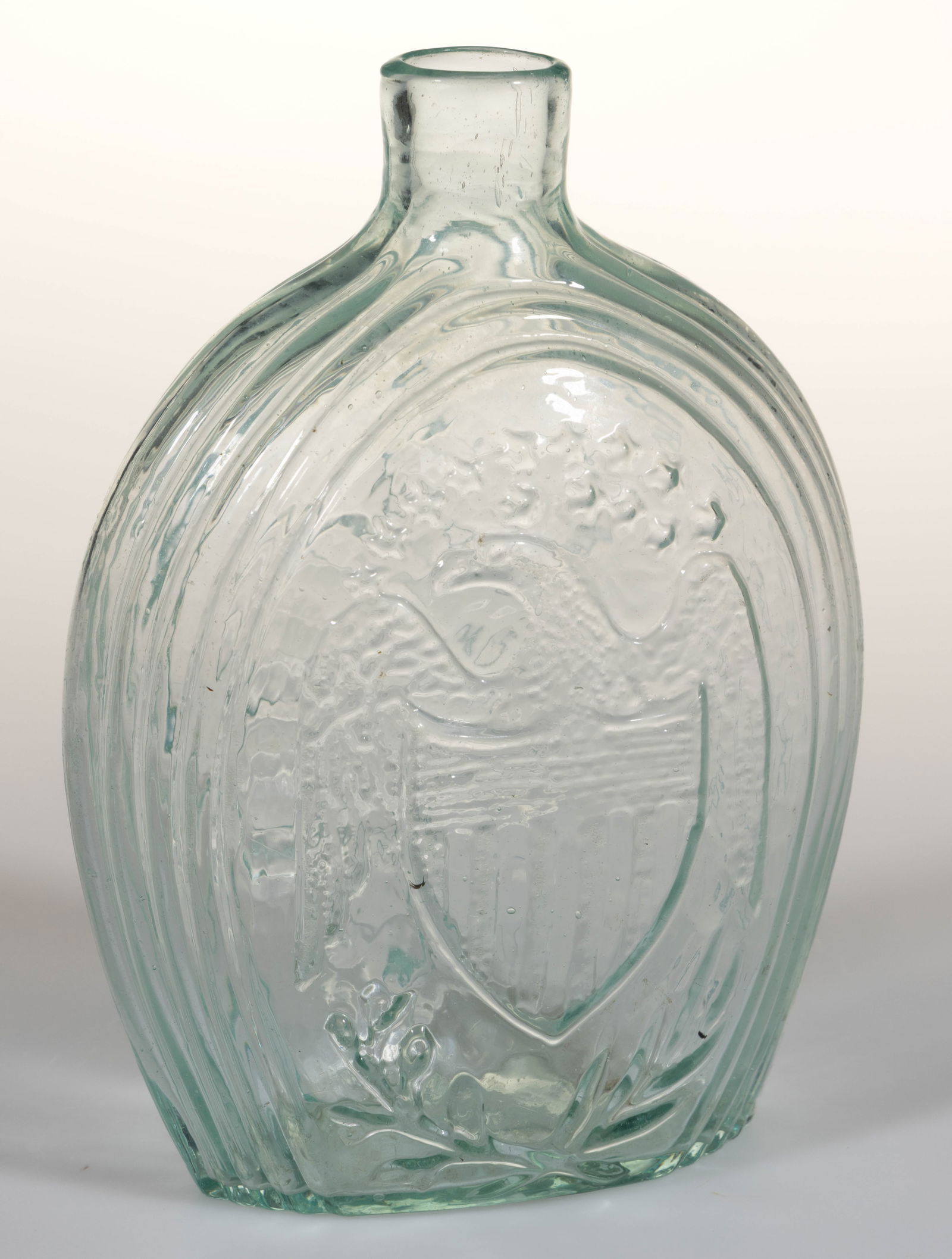 GII-52 EAGLE - FURLED FLAG "FOR OUR COUNTRY" PICTORIAL / HISTORICAL FLASK: GII-52 EAGLE - FURLED FLAG "FOR OUR COUNTRY" PICTORIAL / HISTORICAL FLASK, pale greenish aquamarine, pint, obverse with a left-facing shield-breasted eagle, reverse embossed "FOR O