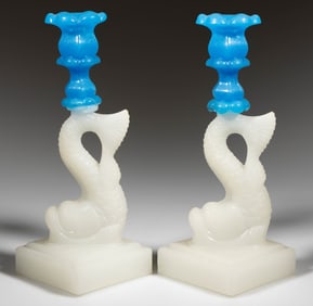 PRESSED DOLPHIN SINGLE-STEP PRESSED GLASS PAIR OF CANDLESTICKS