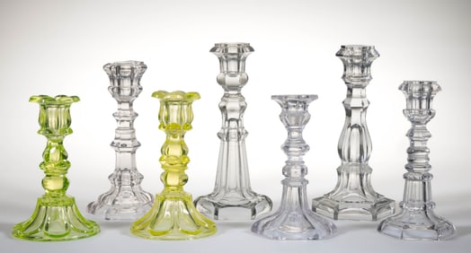 ASSORTED PRESSED PETAL AND HEXAGONAL PATTERNED CANDLESTICKS, LOT OF SEVEN