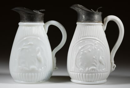 BLOWN-MOLDED STORK & SWAN MOLASSES JUGS, LOT OF TWO