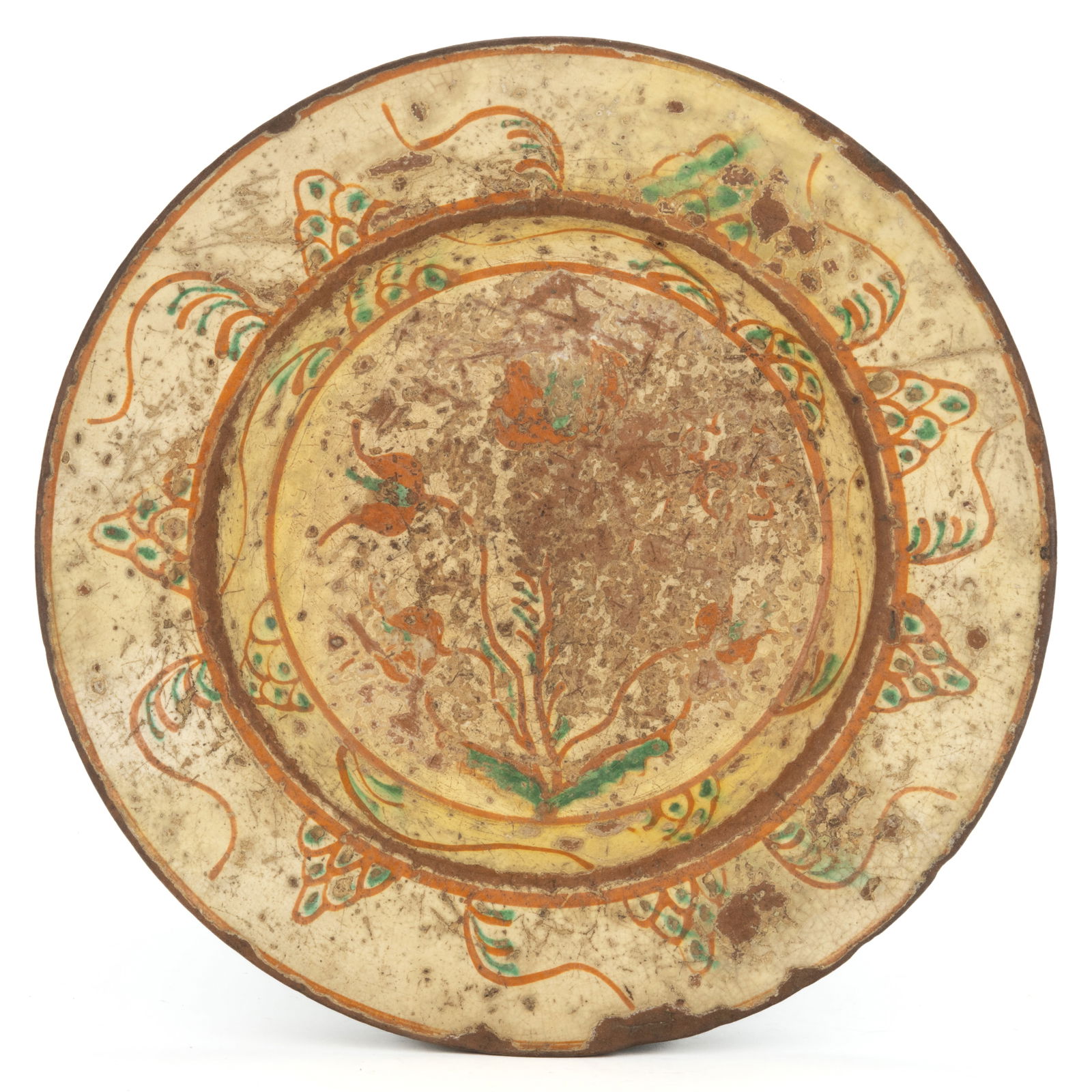 IMPORTANT SALEM, NORTH CAROLINA MORAVIAN POLYCHROME-DECORATED EARTHENWARE / REDWARE PLATE OR DISH: IMPORTANT SALEM, NORTH CAROLINA MORAVIAN POLYCHROME-DECORATED EARTHENWARE / REDWARE PLATE OR DISH, single lead-glazed, shallow interior featuring a central tulip design of copper- and white-slip over