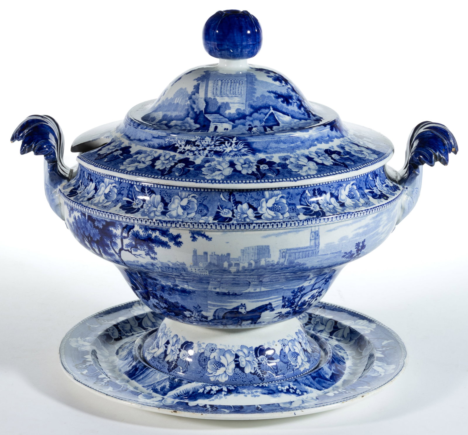 STAFFORDSHIRE BRITISH VIEWS TRANSFER-PRINTED SOUP TUREEN WITH UNDERTRAY: STAFFORDSHIRE BRITISH VIEWS TRANSFER-PRINTED SOUP TUREEN WITH UNDERTRAY, blue transfer scenes from the Rogers Views series including Lancaster view to body depicting a bridge and town with horses