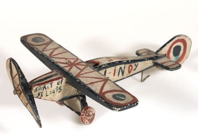 AMERICAN FOLK ART CARVED AND PAINTED "LINDY" WOODEN AIRPLANE TOY