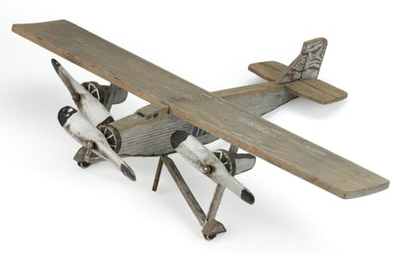 AMERICAN FOLK ART CARVED AND PAINTED WOODEN TOY AIRPLANE