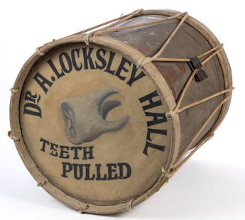 AMERICAN FOLK ART PAINTED ADVERTISING DRUM TRADE SIGN MOVIE PROP: AMERICAN FOLK ART PAINTED ADVERTISING DRUM TRADE SIGN MOVIE PROP, the heads painted to promote the medical services provided by a "DR. A. LOCKSLEY HALL", one marked "TEETH PUL